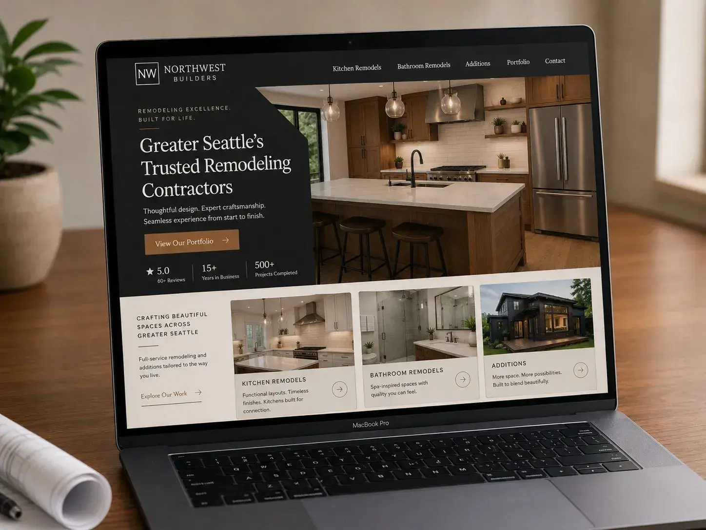 MacBook screen showing an example construction company website with project gallery of kitchens, bathrooms, and additions, portfolio CTA, and phone number, built by ChegTech