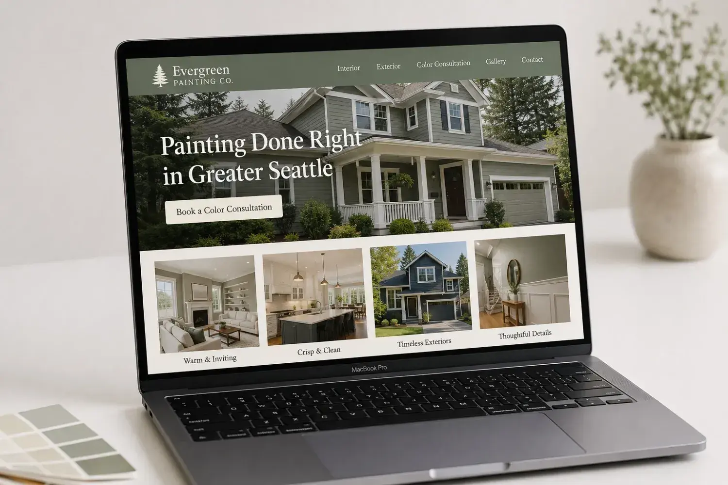MacBook screen showing an example painting company website with interior and exterior portfolio gallery, color consultation CTA, and phone number, built by ChegTech